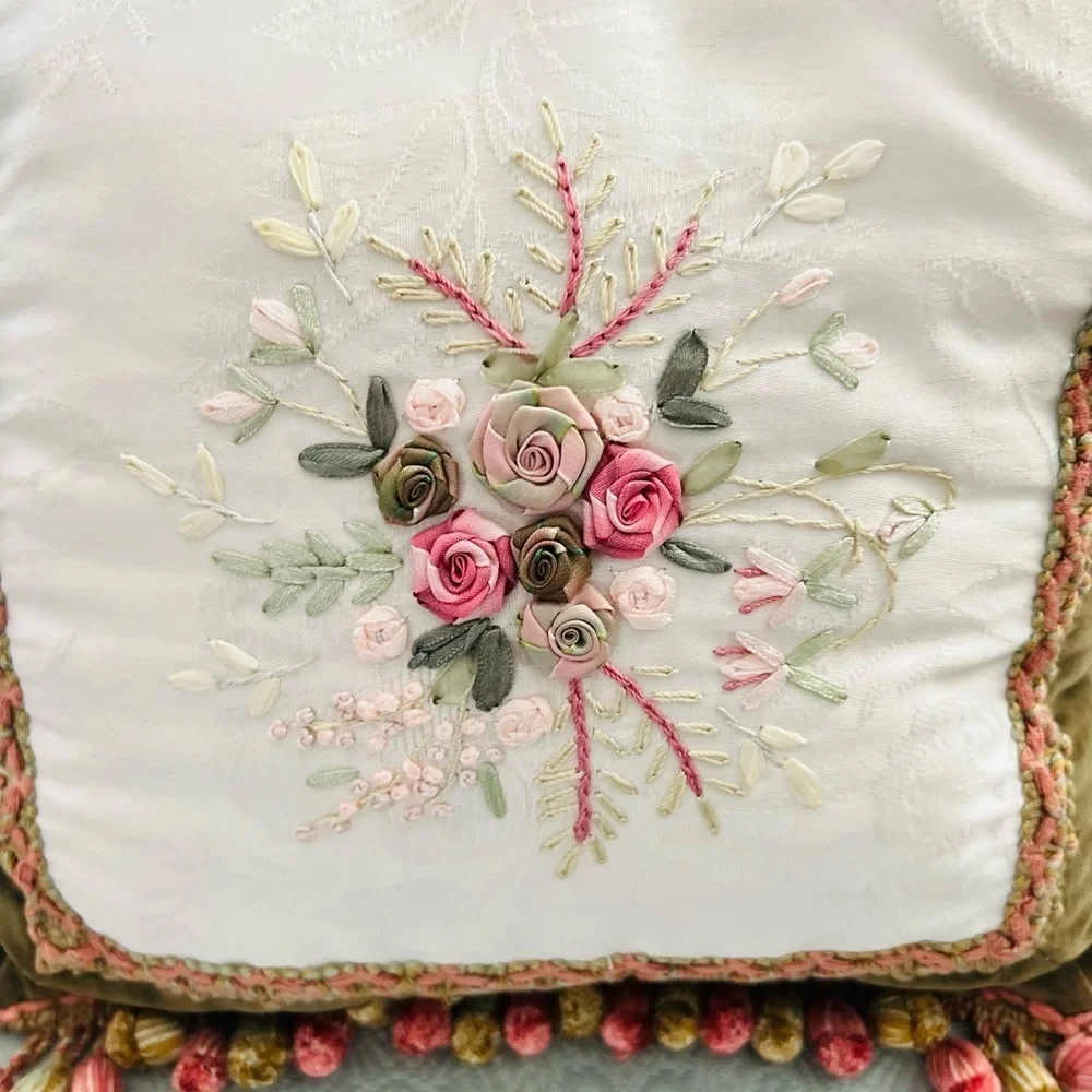 13”x13” decorative pillow hand-stitched ribbon.